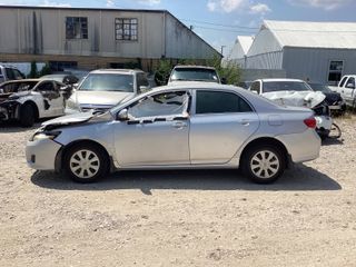 2010 Toyota Corolla LE - Exterior Side Driver Image